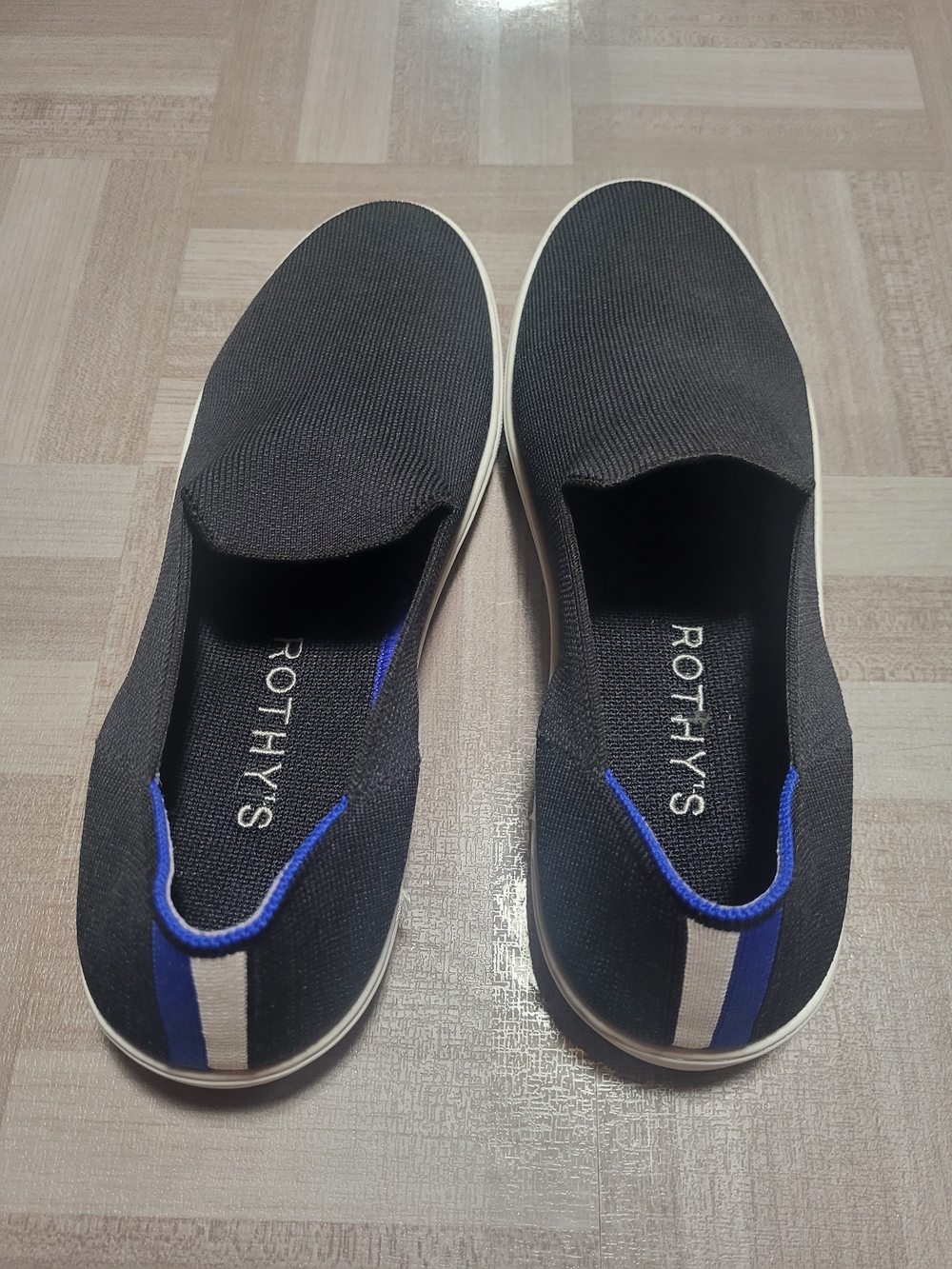 Rothy's Black Slip-On Loafers with Blue and White Stripe
